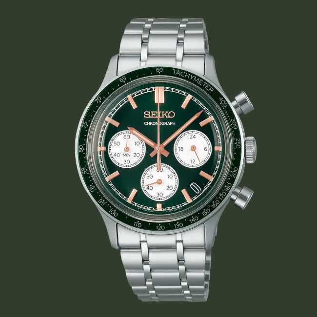 A Seiko chronograph watch with a silver stainless steel link bracelet, a dark green dial, and a matching green tachymeter bezel with rose gold markers.