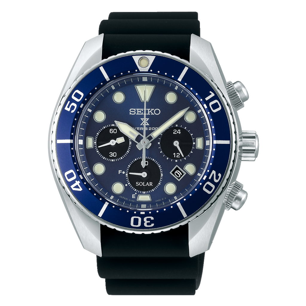 Seiko watch with blue dial and black strap on a black background