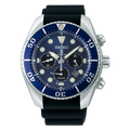 Seiko watch with blue dial and black strap on a black background