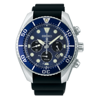 Seiko watch with blue dial and black strap on a black background
