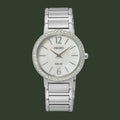Silver Seiko watch with crystal bezel on a white background