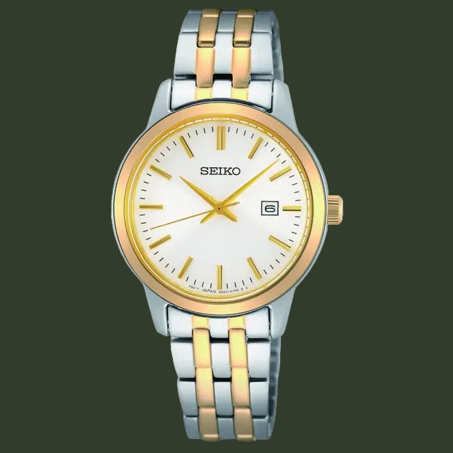 A Seiko women's analog watch with a silver and gold-tone two-tone stainless steel link bracelet, a gold-tone bezel, and a white dial with gold hands and hour markers.