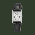 A Seiko analog wristwatch with a silver-tone rectangular case, white dial with black Roman numerals, and a black leather strap, shown against a plain white background.