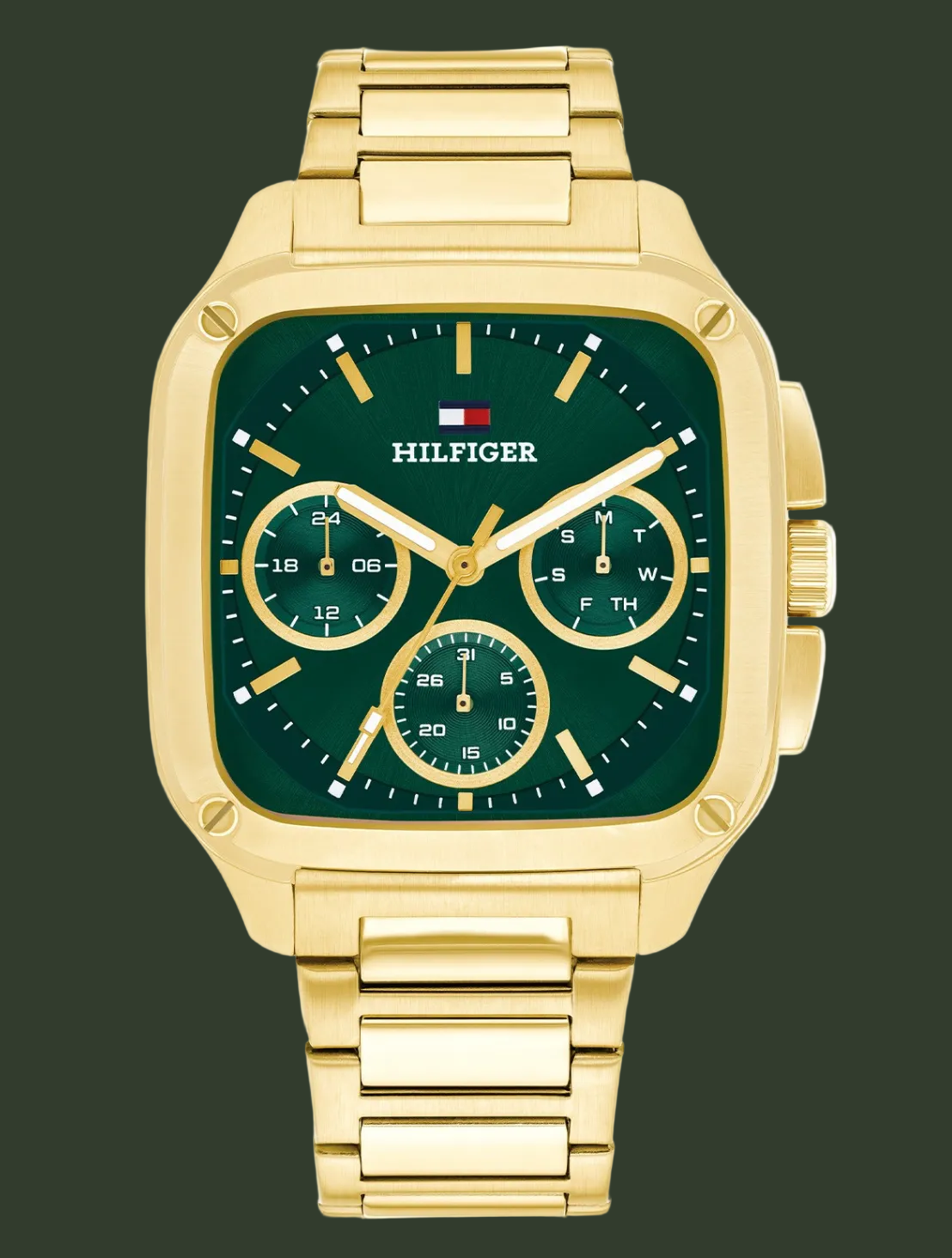 Gold watch with green face and Tommy Hilfiger logo on a white background