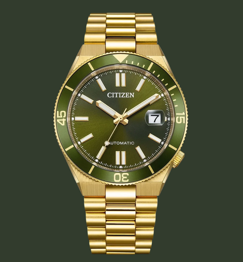 Gold watch with green face on a white background