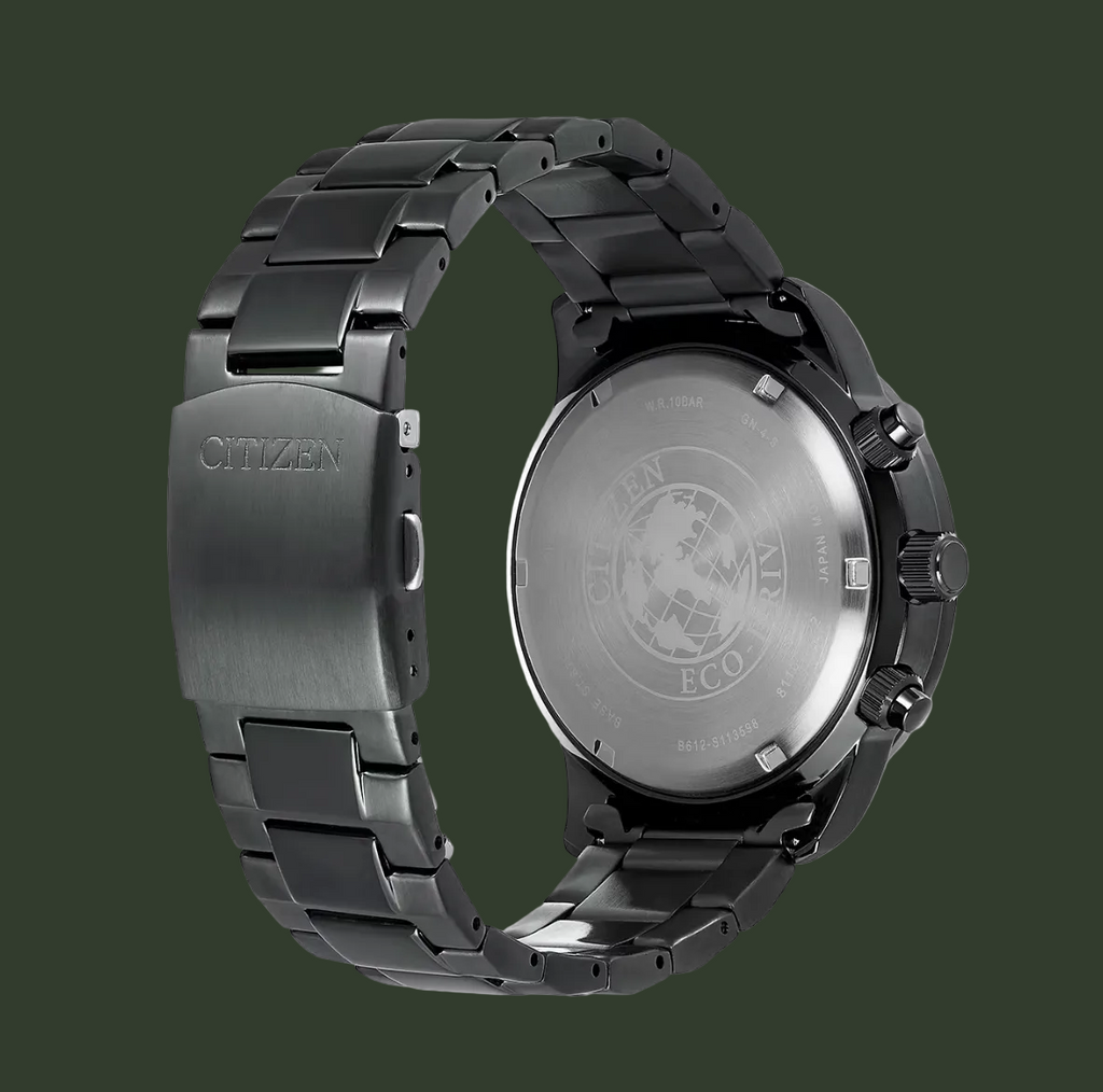 Citizen Eco-Drive watch shown from the back, featuring a black metal link bracelet and a black case with a brushed silver-toned back cover.