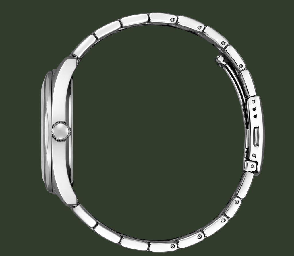A close-up top-down view of a silver stainless steel smartwatch band with a matching silver watch case, featuring a textured crown button and a clean white background.