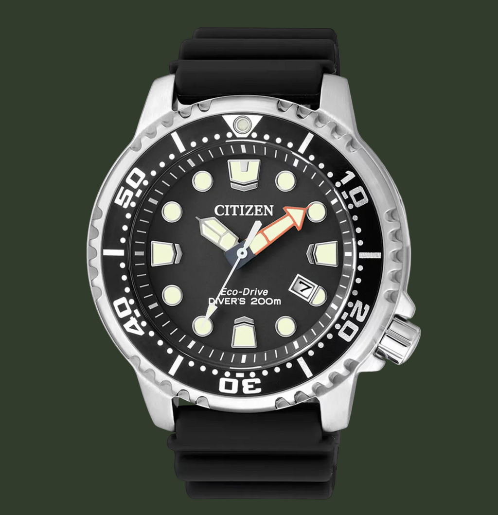 Citizen Eco-Drive Divers 200m watch with a black dial, silver stainless steel case, and black rubber strap, shown on a clean white background.