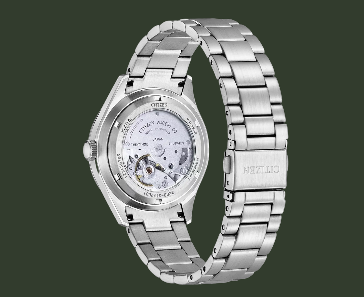 A silver stainless steel Citizen watch with a transparent back case showing the internal mechanical movement, displayed on a clean white background.