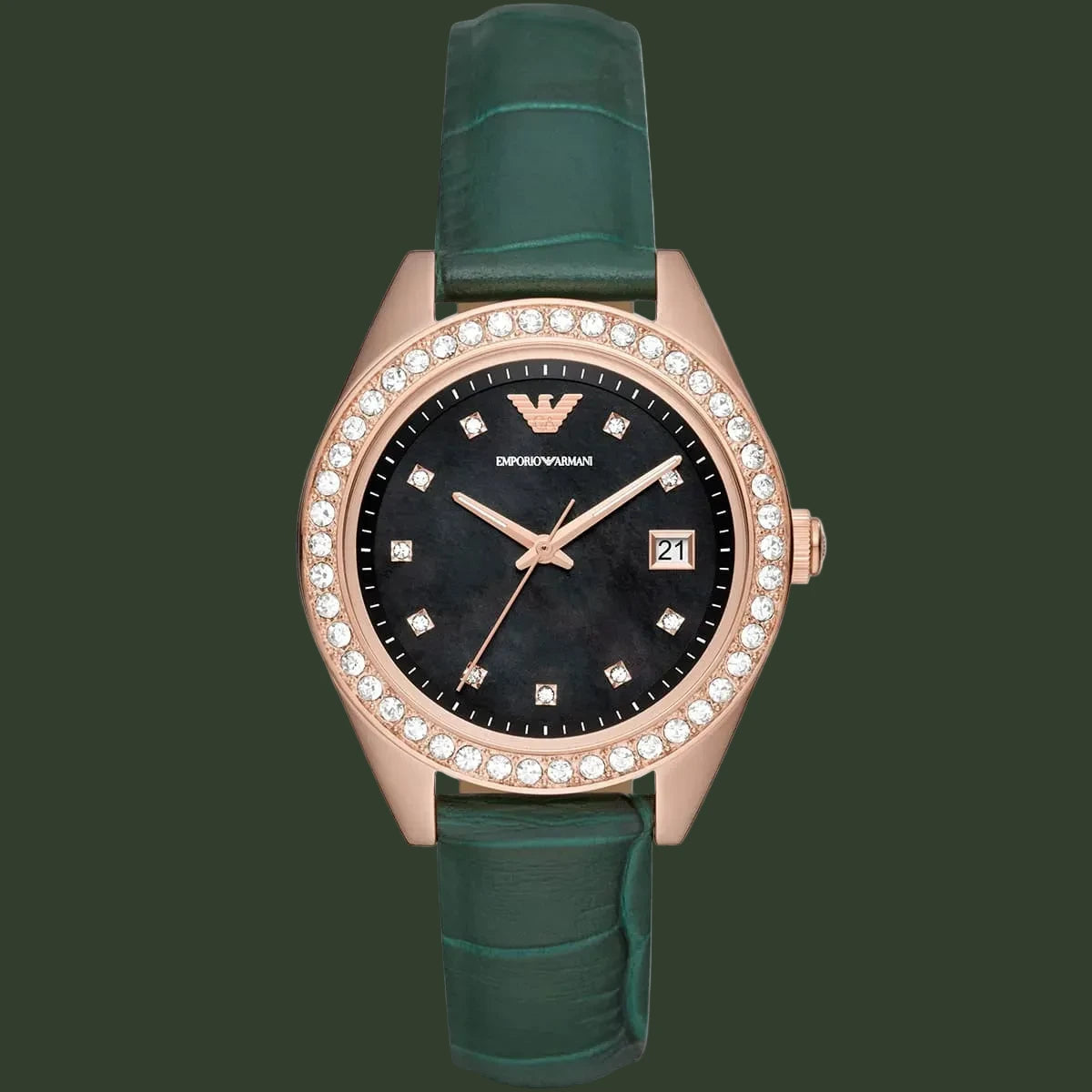 Watch with green strap and rose gold case on white background