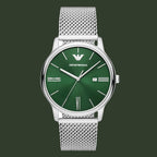 Green watch with silver mesh strap on a white background