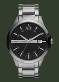 Armani Exchange men's analog watch with a silver stainless steel case and link bracelet, featuring a black textured dial with silver-tone hands, white hour markers, and a date window showing '21'.