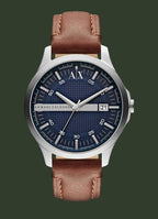 Armani Exchange watch with brown leather strap and blue dial on a white background
