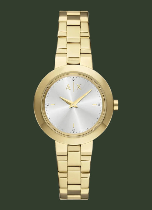Gold watch with a silver face on a white background