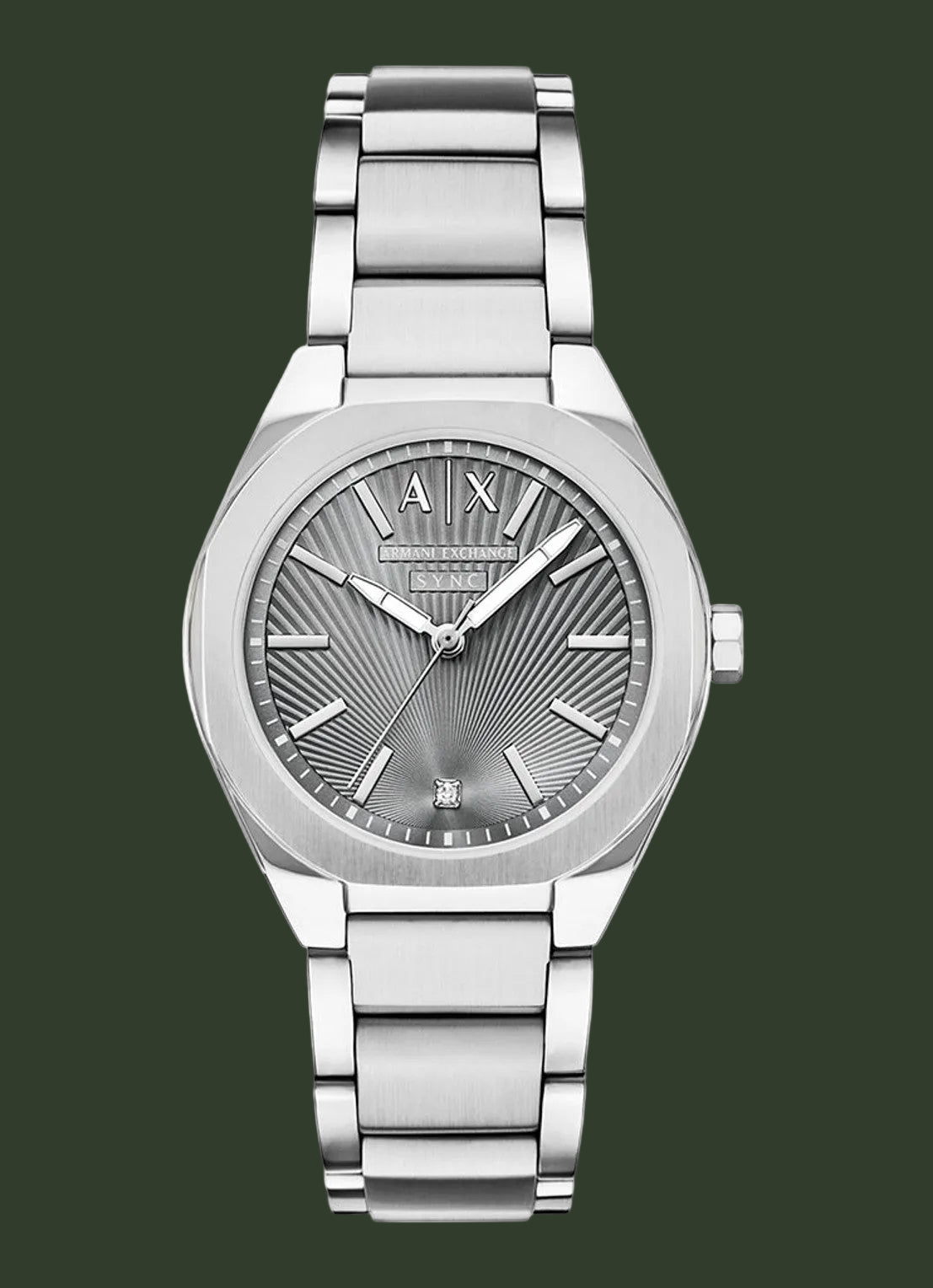 An analog wristwatch with a silver stainless steel case and integrated metal link bracelet, featuring a textured sunburst dial with silver-tone hands and markers.