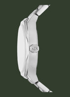 Close-up side profile of a silver stainless steel watch with a matching metal link bracelet, featuring the 'A|X' logo on the crown guard, set against a plain white background.