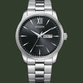 Silver Citizen watch with black dial on a white background