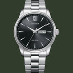 Silver Citizen watch with black dial on a white background