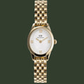 A Daniel Wellington DW001 women's watch featuring a gold-tone stainless steel case and link bracelet, a white dial with gold-tone Roman numerals and hands, and a crown on the right side of the case.