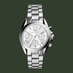 Silver watch with a detailed face on a white background 