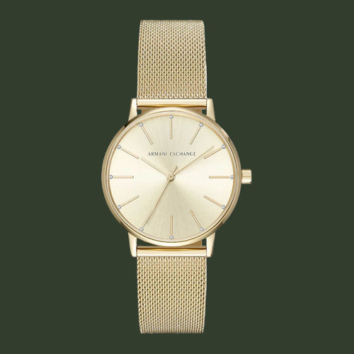 Gold watch with mesh strap on a white background