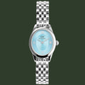 A silver-tone metal wristwatch with a round light blue dial, Roman numeral hour markers, and a matching silver link bracelet, shown against a plain white background.