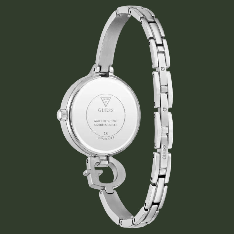 Silver stainless steel women's watch shown from the back, featuring a round case, metal link bracelet, and the GUESS logo on the back glass.