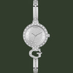 A silver-tone Guess bangle watch with a crystal-encrusted bezel, crystal-detailed dial, and signature 'G' bracelet connector, shown on a plain white background.