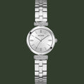 Silver Guess watch with a detailed bracelet on a white background