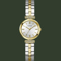 Two-tone gold and silver watch with a white face on a white background