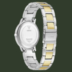The back view of a Guess women's watch with a stainless steel link bracelet featuring gold-tone inlay, shown on a white background.
