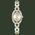 A Guess women's two-tone watch with a silver and gold-tone link bracelet, a silver oval case, and a white dial accented with gold-tone details and crystal rhinestones.