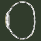 A silver-toned metal link bracelet watch band shown from the side profile against a plain white background.