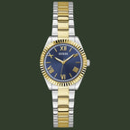 A Guess women's two-tone metal watch with a blue dial, gold-tone Roman numerals, and a link bracelet alternating between gold and silver-tone stainless steel.