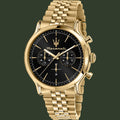 Gold watch with black face on a white background