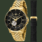 Gold watch with black face and additional black strap on a white background