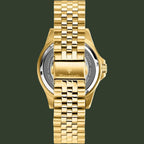 Gold-tone stainless steel watch with a matching link bracelet, shown from the back on a white background. The case back features a clear crystal and a gold-tone clasp with the 'Maserati' brand name engraved.
