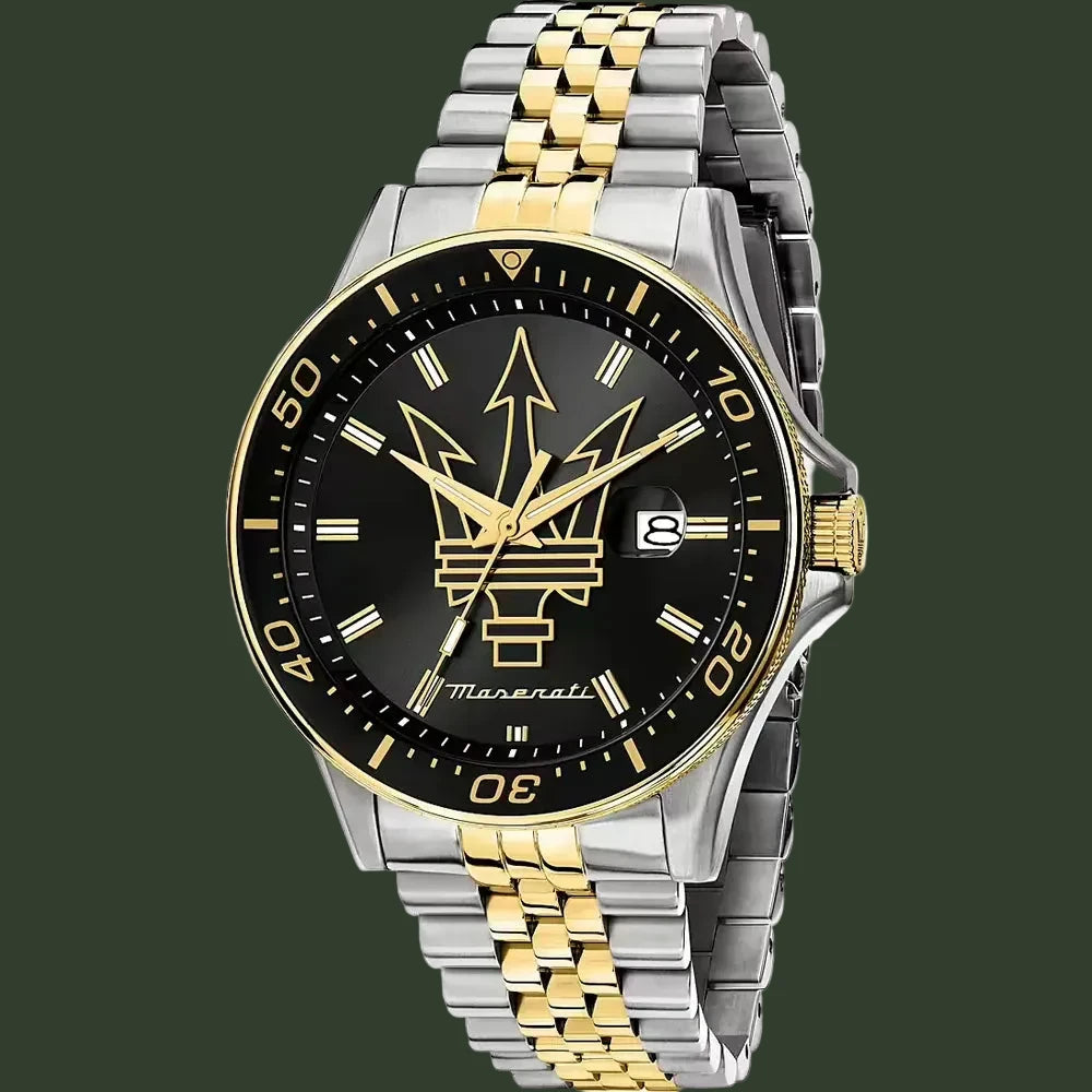 Two-tone watch with black face and gold accents on a white background
