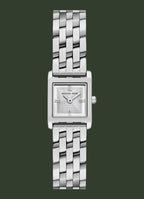 Silver watch with a square face on a white background