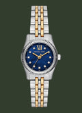 Two-tone watch with a blue face and gold accents on a white background