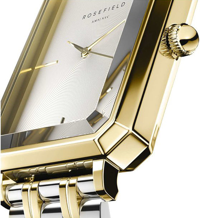 Close-up of a Rosefield watch with a gold-tone geometric case, silver dial, and matching gold and silver link bracelet on a white background.