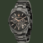 A Maserati men's chronograph watch featuring a black stainless steel case and link bracelet, with a black dial accented by rose gold-tone hands, markers, and logo details.