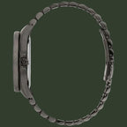 A dark gunmetal gray stainless steel watch band with a textured crown and a matching dark case, shown from the side profile on a white background.