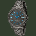 A Maserati men's analog watch featuring a dark gunmetal gray metal bracelet and case, a matching dark dial with bright blue hands and hour markers, and a date window at 3 o'clock.