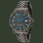 A Maserati men's analog watch featuring a dark gunmetal gray metal bracelet and case, a matching dark dial with bright blue hands and hour markers, and a date window at 3 o'clock.