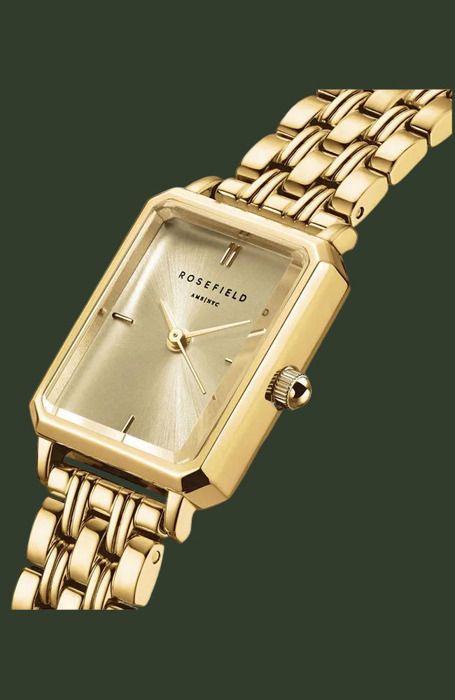 A gold-tone Rosefield women's watch with a rectangular bezel, matching gold dial, and a multi-link metal bracelet, shown against a plain white background.