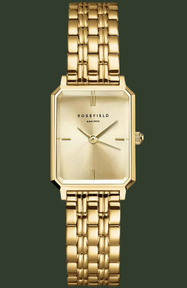 A gold-tone RODEFIELD wristwatch with a rectangular bezel, matching gold dial, and a multi-link metal bracelet, shown against a plain white background.