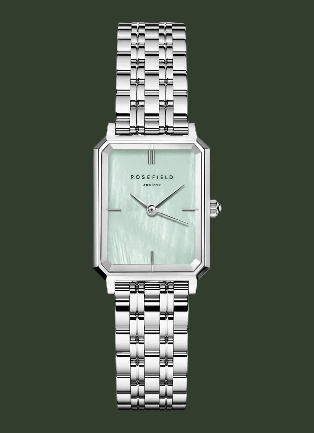Silver watch with a light green face on a white background
