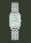Silver watch with a light green face on a white background