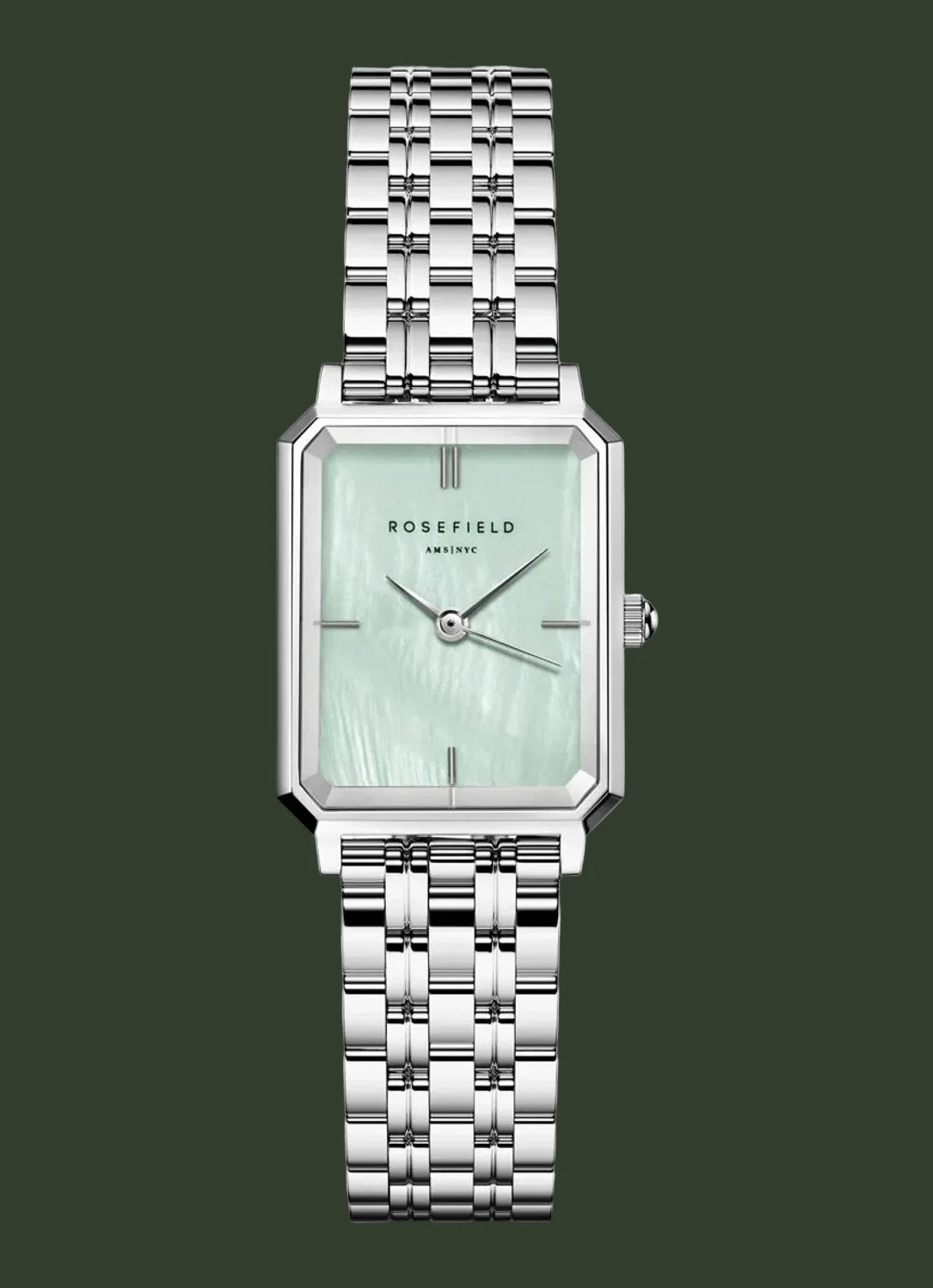 Silver watch with a light green face on a white background